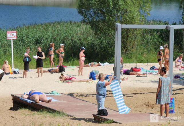 Выживание в жару: фоторепортаж с пляжей Нижнего Новгорода - фото 57